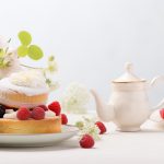 Tea and scones with raspberries scattered. Afternoon tea in Leighton Buzzard