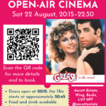 Open air cinema featuring grease movie image